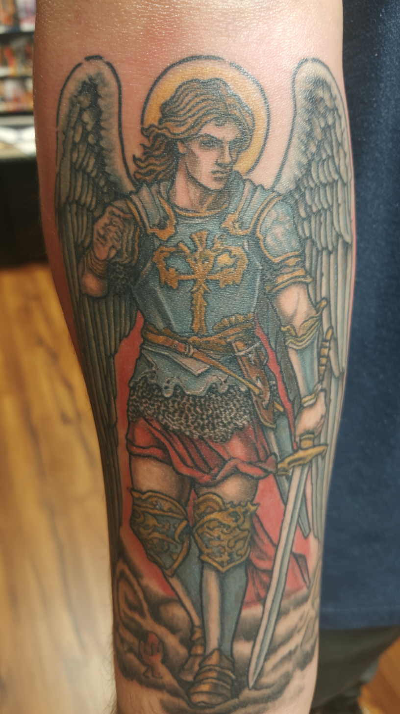 Memorial Angel Tattoo Designs: Honoring Loved Ones