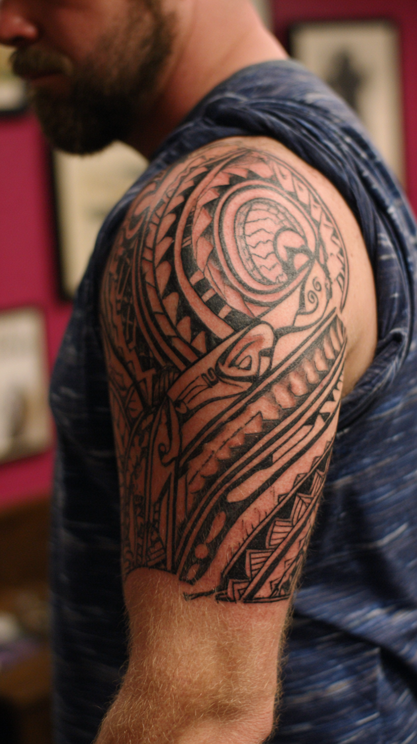 Tribal Upper Arm Tattoos