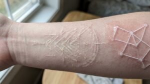 do white ink tattoos last
